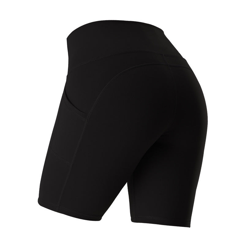 Fitness leggings with pockets lifestyle shot showing hands-free convenience