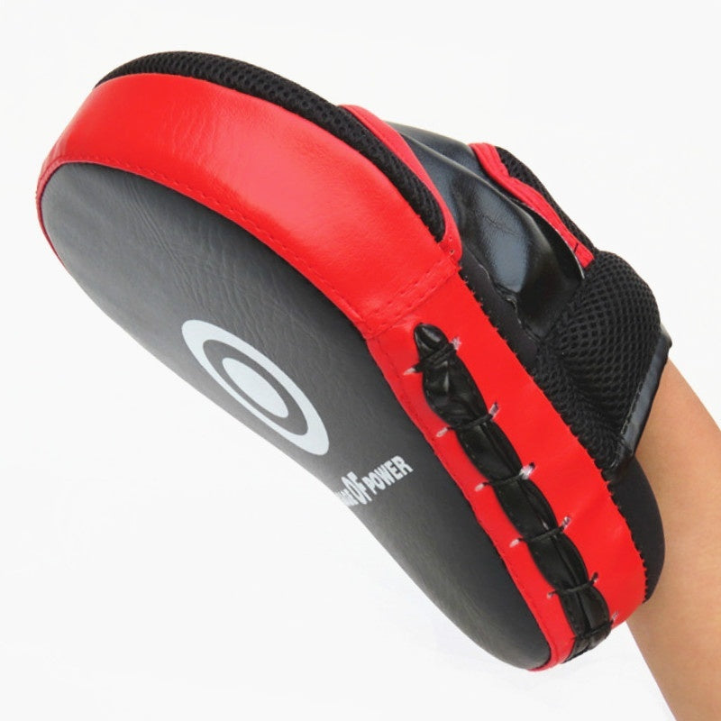 Close-up of ergonomic design on professional boxing pads showing durable construction