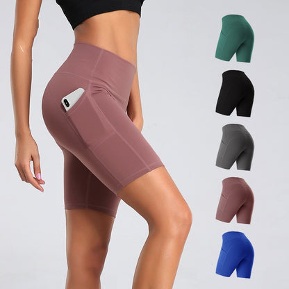 High-waist workout leggings with side pockets showing hip-lifting design for fitness
