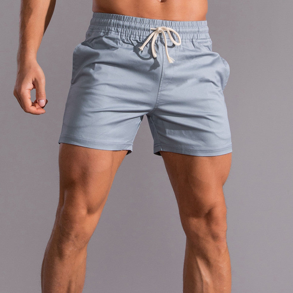 Men's cotton shorts showing comfortable mid-waist design and straight-leg fit